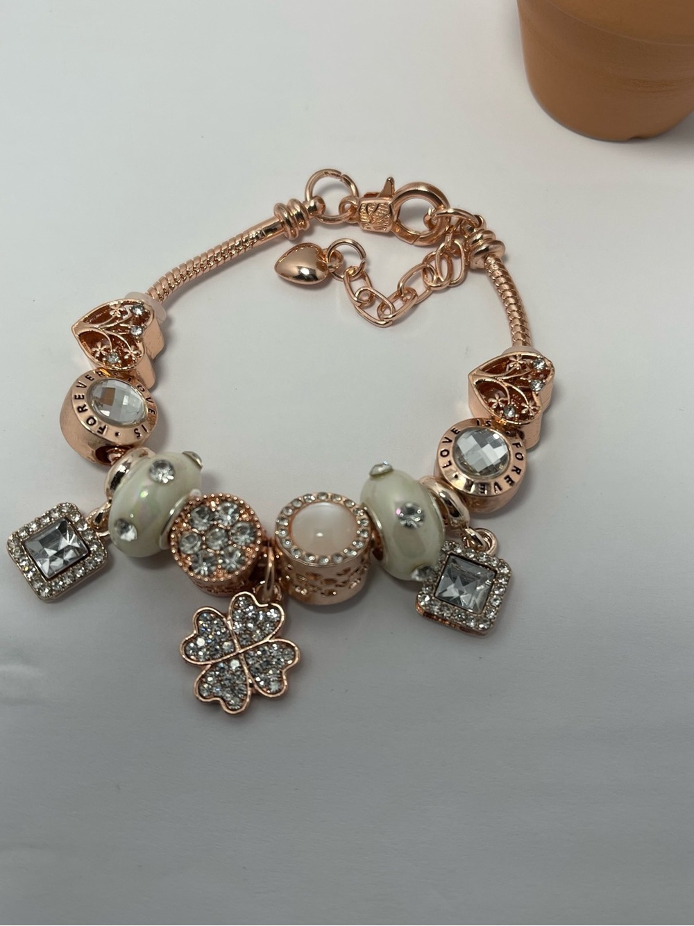 Rose Gold Charm Bracelet with White Enamel Beads and Crystal Accents